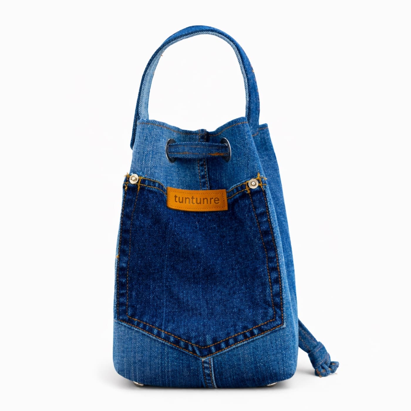 Drawstring bucket bag made from two tones of upcycled denim
